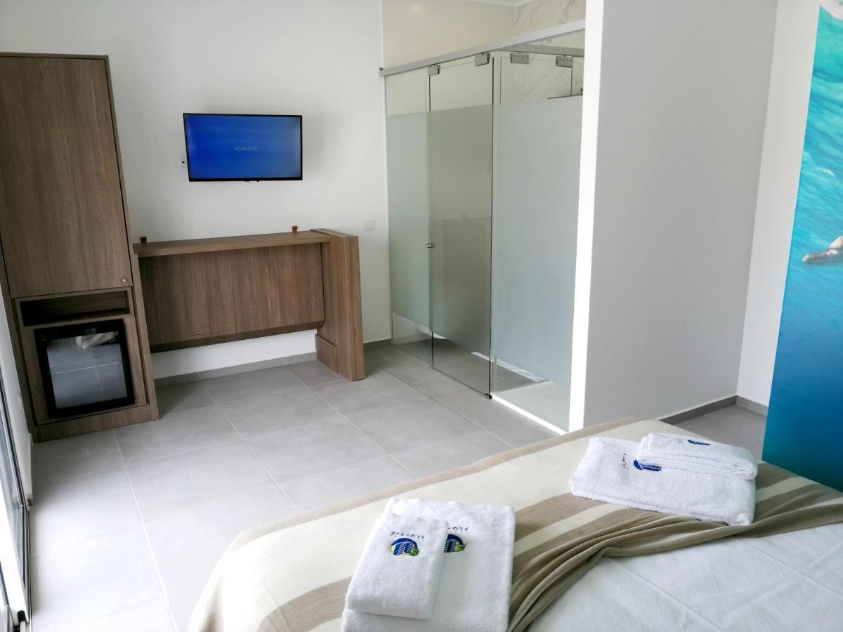 Suites Paradise Algarve Quarteira Bagian luar foto