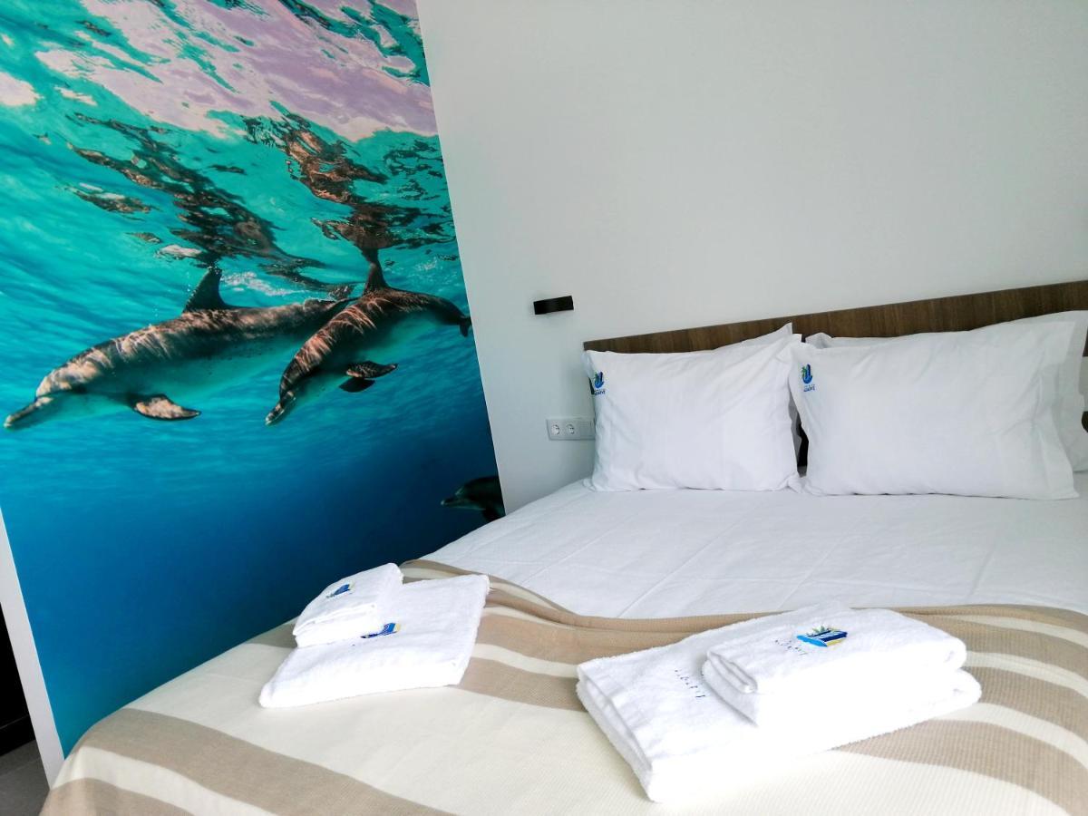 Suites Paradise Algarve Quarteira Bagian luar foto