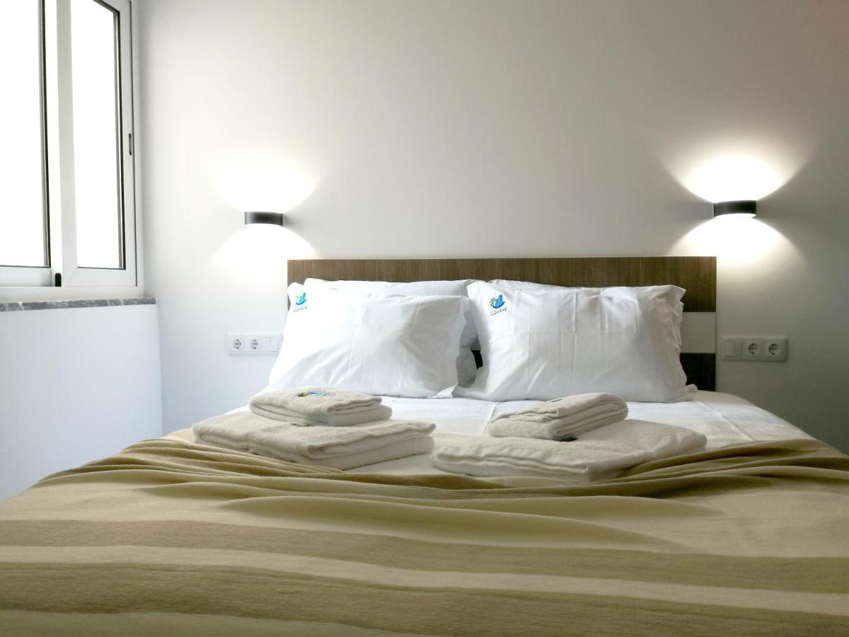 Suites Paradise Algarve Quarteira Bagian luar foto